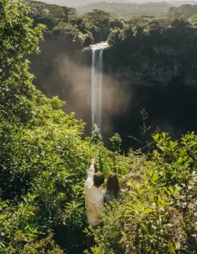 Couple Enjoying the Chamarel Waterfalls from a view in Mauritius